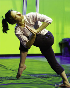 Michelle Dortignac works an acrobat move on the silks