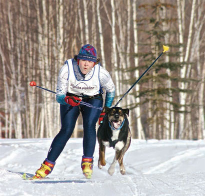 Kriya Dunlap skijoring with her dog Brahma.