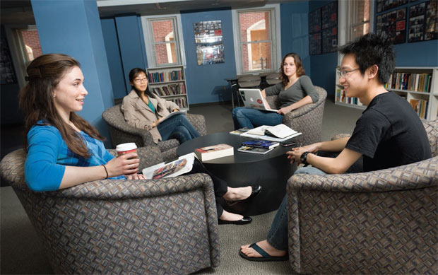 Students sit and socialize in the center's lounge.
