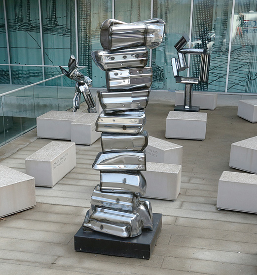 Chrome art statues, column of rectangular shapes.