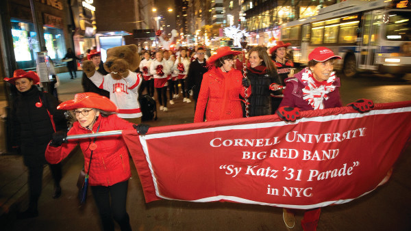 Sy Katz parade with Cornell Banner